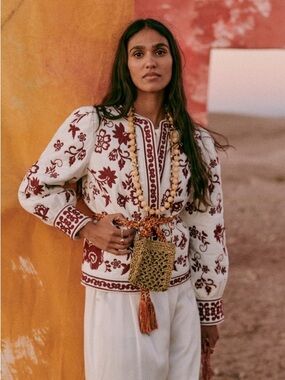 Sézane Ewan Jacket in an ecru and burgundy floral embroidered design.